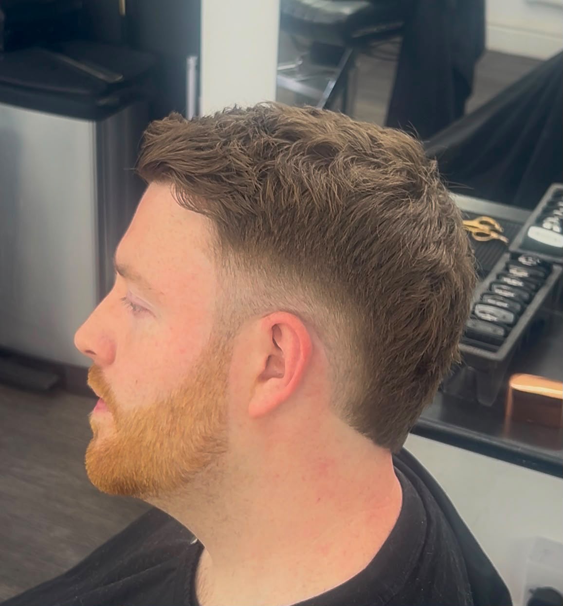 Textured crop with clean fade and beard